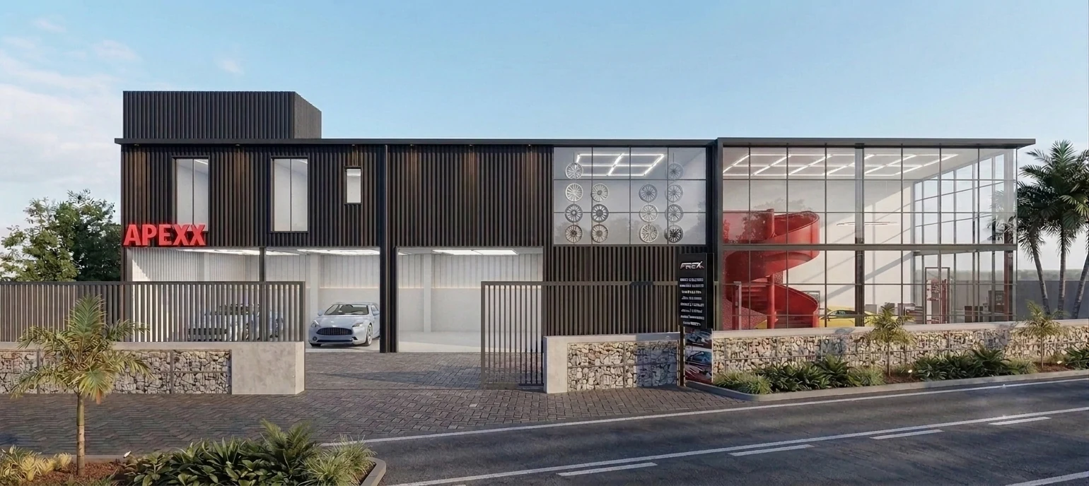 Front elevation of Car Workshop with industrial cladding and a glazed showroom