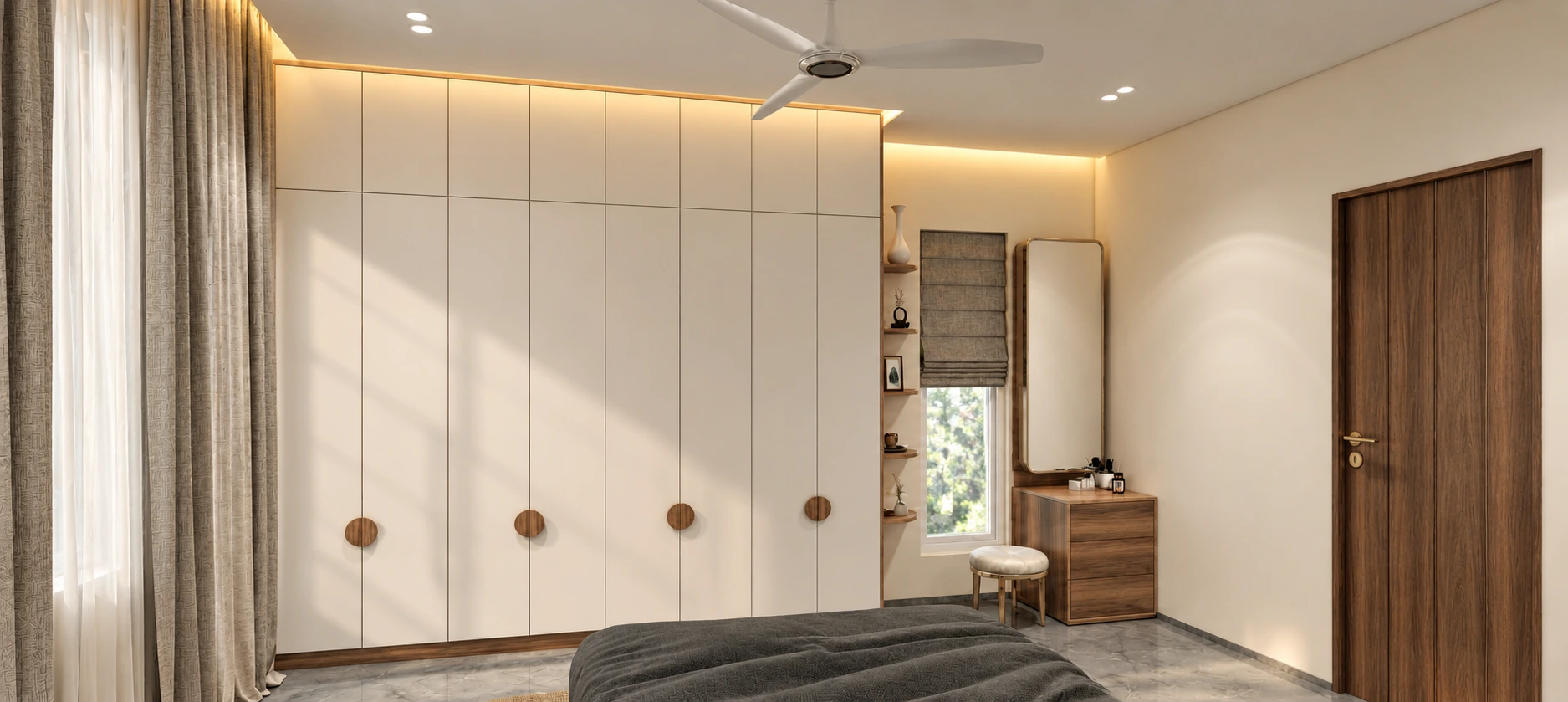Pale full-height wardrobes, a timber dressing table and a window beside it
